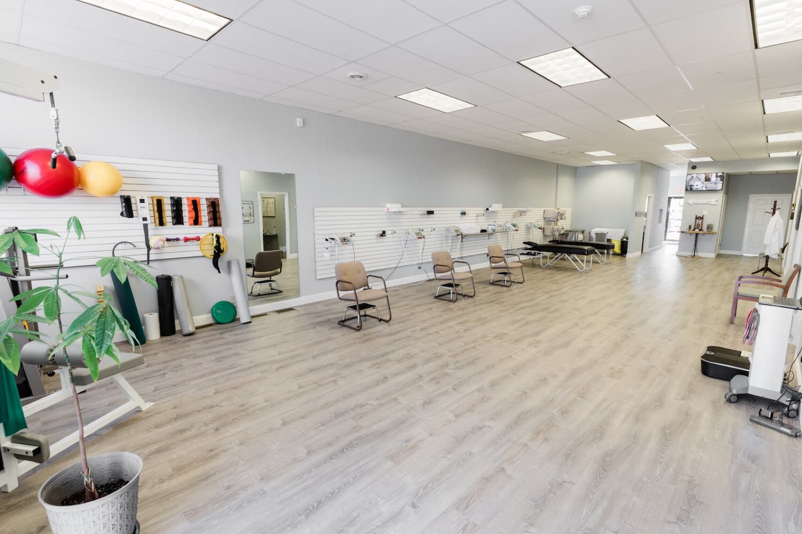 The bright, open treatment floor at Omni's East Haven clinic on Main Street